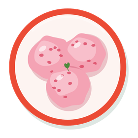 Bolitas dulces rosadas en un plato.
